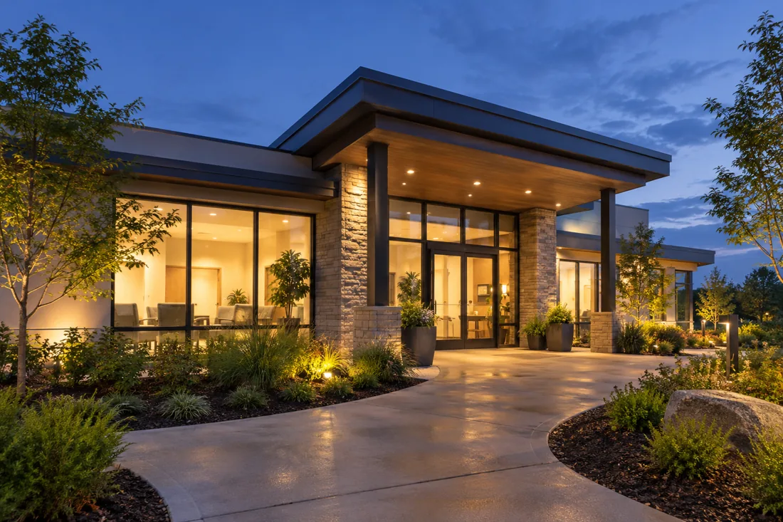 A welcoming medical clinic exterior at dusk